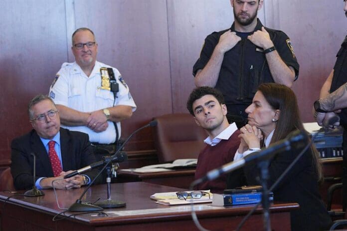 Luigi Mangione (C) appears for a hearing in New York State Supreme Court with his attorneys Karen Friedman Agnifilo (R) and Marc Agnifilo (L) on charges that he murdered UnitedHealthcare CEO Brian Thompson in New York, New York, US, 23 December 2024. EFE/EPA/CURTIS MEANS / POOL