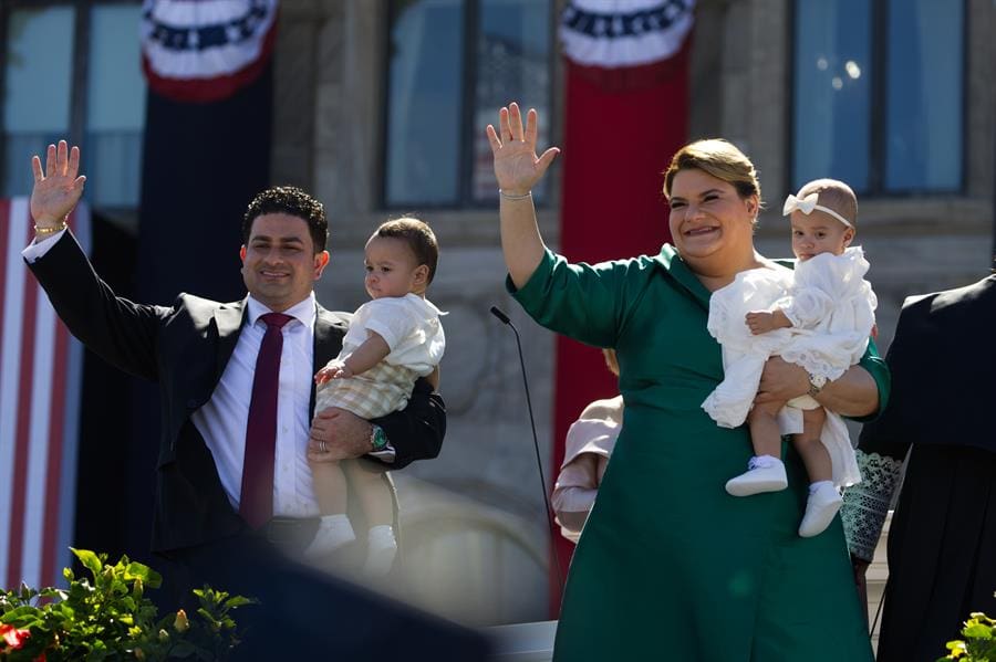 The governor of Puerto Rico Jenniffer Gonzalez (R) waves accompanied by her husband and Jose Jovin and sons Jose Yovin Jorge and Jenniffer Nydia Mercedes during her investiture, in front of the Capitol in San Juan, Puerto Rico, 2 January 2025. EFE/ Thais Llorca