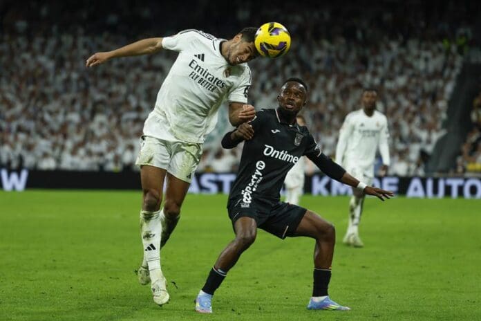Real Madrid's Jude Bellingham (L) in action during LaLiga soccer match between Real Madrid and Leganes at Santiago Bernabeu Stadium in Madrid, Spain, Mar. 29, 2025. EFE/Mariscal