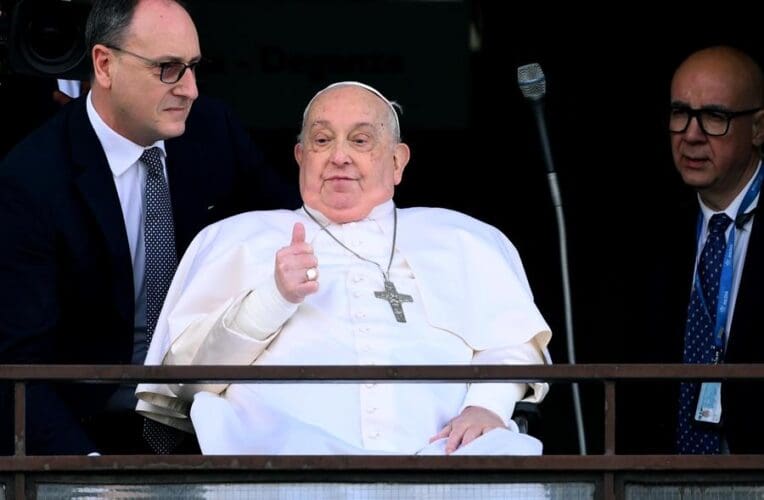 Pope Francis (C) greets and blesses the faithful from the balcony of the Gemelli hospital where has been hospitalized, in Rome, Italy, 23 March 2025. EFE-EPA/ETTORE FERRARI
