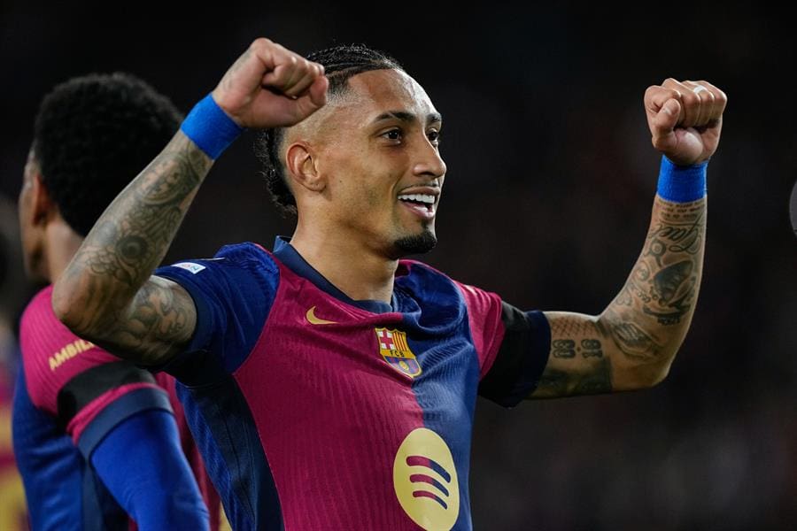 Barcelona's Brazilian midfielder Raphinha celebrates his goal against Benfica during the Champions League round of 16 second leg match between Barcelona and Benfica, at the Estadi Olimpic Lluis Companys in Barcelona, Spain, 11 March 2025. EFE/ Enric Fontcuberta