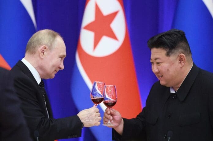 Russian President Vladimir Putin (L) and North Korean leader Kim Jong Un make a toast during a state reception on behalf of DPRK leader Kim Jong-un in honor of Vladimir Putin at the Reception House 'Monnangwan' in Pyongyang, North Korea,19 June 2024. EFE-EPA/VLADIMIR SMIRNOV/SPUTNIK/ KREMLIN POOL/FILE