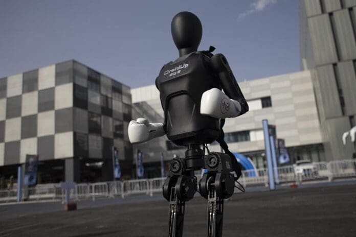 A humanoid robot is seen ahead of a humans and robots race in Beijing, China, 17 April 2025. EFE/EPA/ANDRES MARTINEZ CASARES
