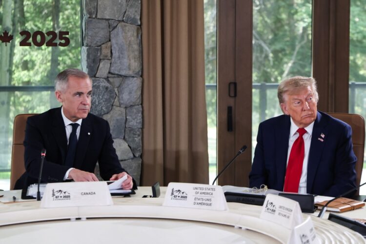Canadian Prime Minister Mark Carney (L) and US President Donald Trump attend a working session during the Group of Seven (G7) Summit at the Pomeroy Kananaskis Mountain Lodge, in Kananaskis, Alberta, Canada, Jun. 16, 2025. EFE/EPA/LUDOVIC MARIN / POOL