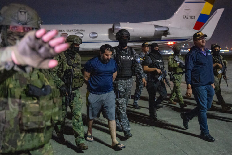 Drug trafficker Jose Adolfo Macias Villamar Fito (C) is guarded by members of the Ecuadorian Army and Police in Guayaquil, Ecuador, 25 June 2025. EFE/Mauricio Torres