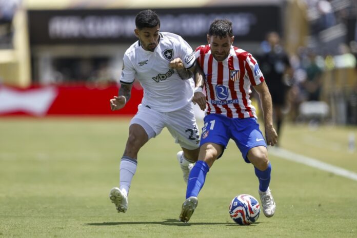 Santiago Rodriguez of Botafogo (L) in action against Javi Galan of Atletico Madrid during the FIFA Club World Cup 2025 soccer match between Atletico Madrid and Botafogo, in Pasadena, California, USA, 23 June 2025. EFE-EPA/CAROLINE BREHMAN