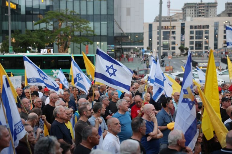 Reservists and former pilots from the Israel Air Force take part in a protest outside the Kirya military headquarters in Tel Aviv, Israel, Aug. 12, 2025. EFE/EPA/ABIR SULTAN