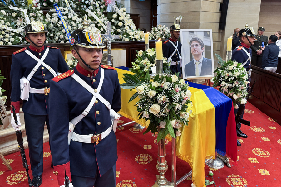 Members of the Presidential Guard Battalion stand guard next to the coffin of the late senator and opposition presidential candidate Miguel Uribe Turbay on Tuesday in Bogotá, Colombia. Aug. 12, 2025. EFE/Carlos Ortega