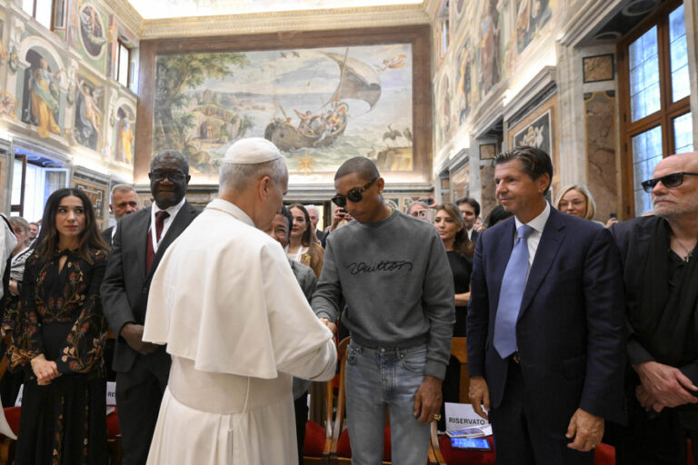 The Pope greets Pharrell Williams on the eve of the Vatican mega-concert. The Pope greets Pharrell Williams on the eve of the Vatican mega-concert.