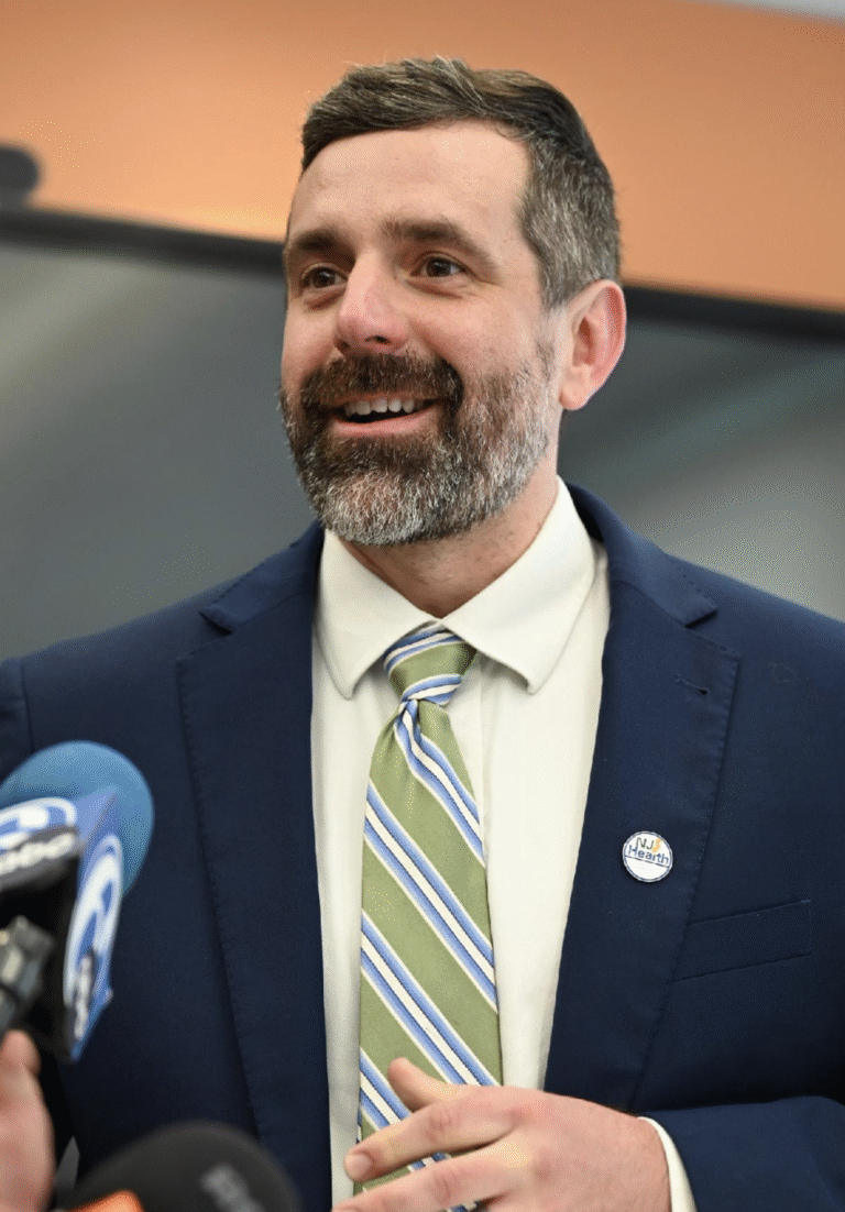 New Jersey Acting Health Commissioner Jeff Brown discusses the importance of staying up-to-date on vaccinations and preparing for respiratory virus season after receiving his flu and COVID-19 vaccinations this morning at the Henry J. Austin Health Center.