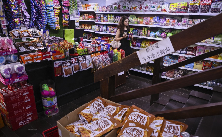 (FILE) A woman shops at a grocery store in Moscow, Russia, 18 July 2025. EFE/EPA/YURI KOCHETKOV