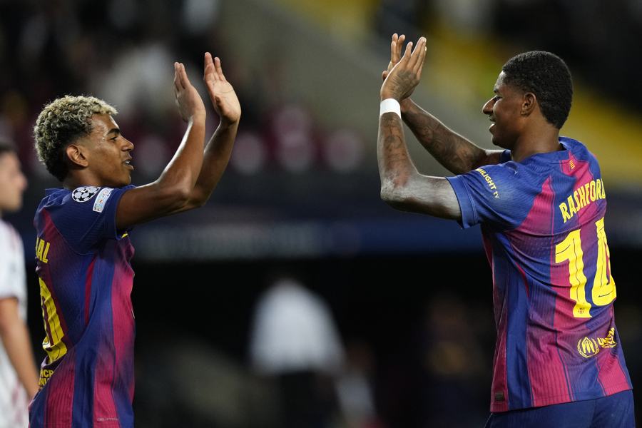 Barcelona forward Marcus Rashford (right) celebrates with Lamine Yamal after scoring a goal during Tuesday's Champions League match between FC Barcelona and Olympiacos FC at the Lluís Companys Olympic Stadium. October 21, 2025. EFE/ Siu Wu