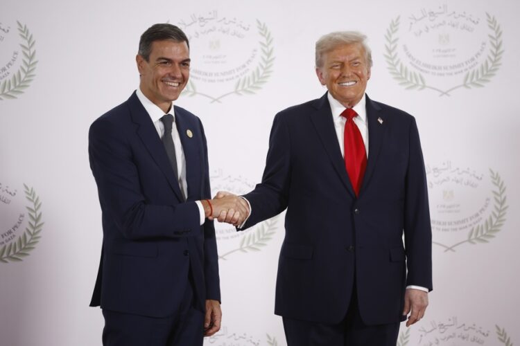 Spanish Prime Minister Pedro Sanchez (L) and and US President Donald Trump shake hands during the greetings ceremony before the family picture at the Gaza Peace Summit in Sharm El-Sheikh, Egypt, Oct. 13, 2025. EFE/EPA/YOAN VALAT / POOL