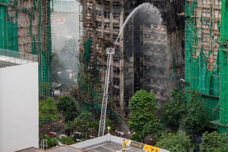 The death toll rises to 65 and 279 missing in Hong Kong’s worst fire in 30 years.