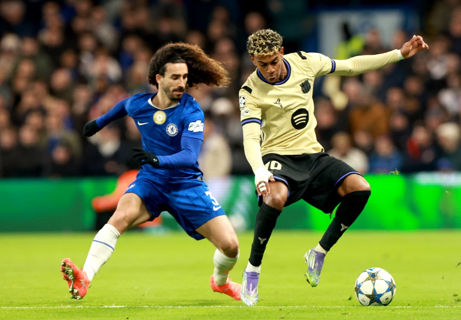 Marc Cucurella (L) of Chelsea in action against Lamine Yamal of Barcelona during the UEFA Champions League league phase match between Chelsea and Barcelona in London, Britain. November 25, 2025. EFE/EPA/NEIL HALL