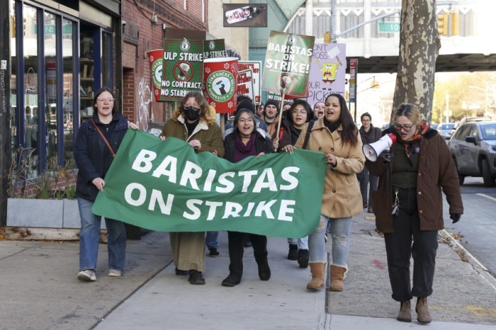 Striking Starbucks workers picket outside a Starbucks before Mayor-elect Zohran Mamdani and Senator Bernie Sanders arrive to join them in the Brooklyn borough of New York, New York, USA, Dec. 1, 2025. EFE/EPA/SARAH YENESEL