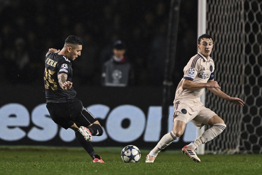 Pedro Bicalho (L) of Qarabaq FK in action against Youri Baas of AFC Ajax during the UEFA Champions League match between Qarabaq FK and AFC Ajax Amsterdam, in Baku, Azerbaijan, Dec. 10, 2025. EFE/EPA/STRINGER