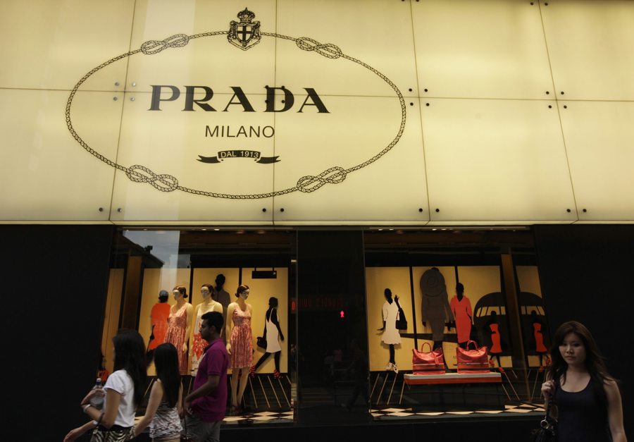 FILE] Several pedestrians walk past a Prada store in Hong Kong. EFE/FILE/Ym Yik