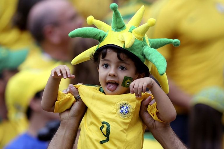 [FILE] A young Brazilian National soccer team supporter cheers up the team against Brazil during their Confederations Cup 2013 soccer match between Brazil and Japan played at the National Stadium of Brasilia, Brazil on 15 June 2013. EFE/Fernando Bizerra Jr