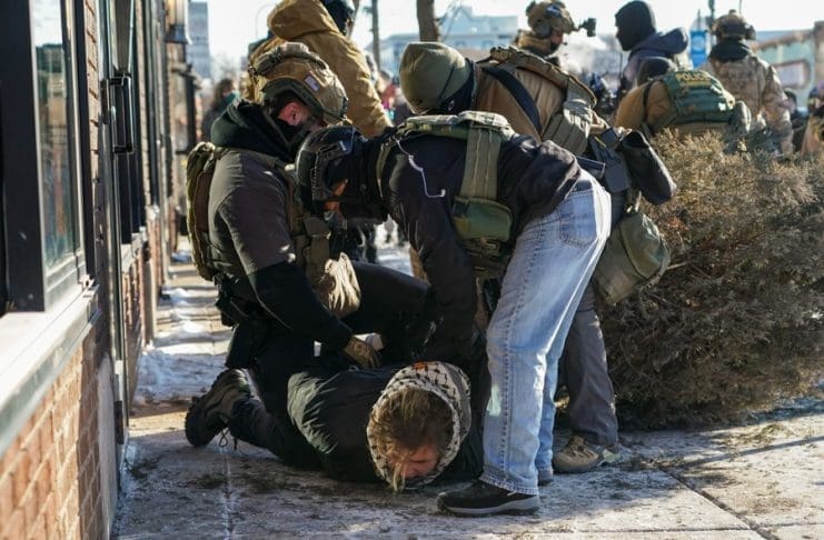 A protester is arrested as people gather after ICE agents shot someone several times while they were trying to detain them in Minneapolis, Minnesota, US, 24 January 2026. EFE/EPA/CRAIG LASSIG