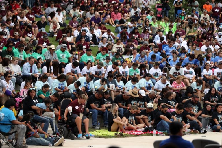 Friends and family pray at a vigil at the Rotary Amphitheater in remembrance of the 19 students and 2 teachers that lost their lives during a mass shooting at Robb Elementary, on the one year anniversary of the shooting, in Uvalde, Texas, USA, 24 May 2023. EFE-EPA/ADAM DAVIS/FILE