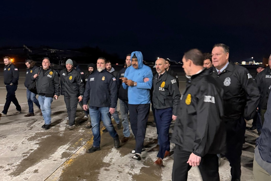 Nicolas Maduro (c) escorted by Drug Enforcement Administration (DEA) agents in New York, United States, 03 January 2026. EFE/ Social Media