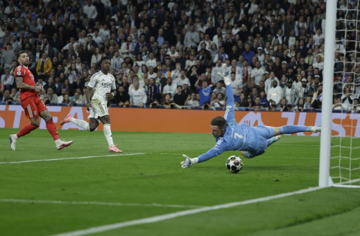 Real Madrid Vinicius Junior (2L) after scoring during the Champions League play-off second leg match between Real Madrid and Benfica at the Santiago Bernabeu stadium in Madrid, Spain. Feb. 25, 2026. EFE/ Juanjo Martin