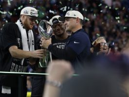 Seattle Seahawks head coach Mike Macdonald (R) hands the Lombardi Trophy to Seattle Seahawks quarterback Sam Darnold (C) as Seattle Seahawks running back and MVP Kenneth Walker III (C) looks on following the NFL Super Bowl LX game between the New England Patriots and the Seattle Seahawks at Levis Stadium in Santa Clara, California, USA, 08 February 2026. EFE-EPA/JOHN G. MABANGLO