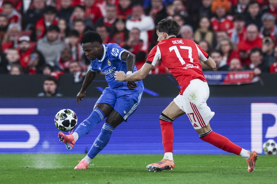 Real Madrid's Vinicius Junior (L) scores a goal against Benfica during their UEFA Champions League play-off 1st leg match between Benfica and Real Madrid in Lisbon, Portugal. Feb. 17, 2026. EFE/EPA/MIGUEL A. LOPES