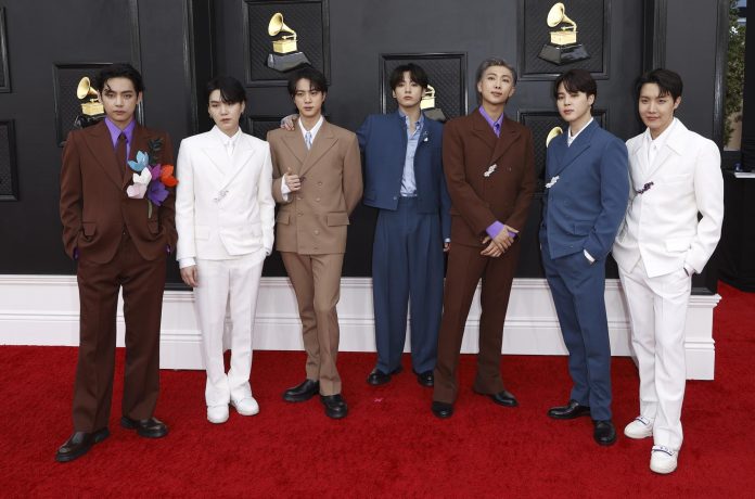 (FILE) (L-R) V, Suga, Jin, Jungkook, RM, Jimin and J-Hope of BTS arrive for the 64th annual Grammy Awards at the MGM Grand Garden Arena in Las Vegas, Nevada, US, 03 April 2022. EFE/EPA/DAVID SWANSON