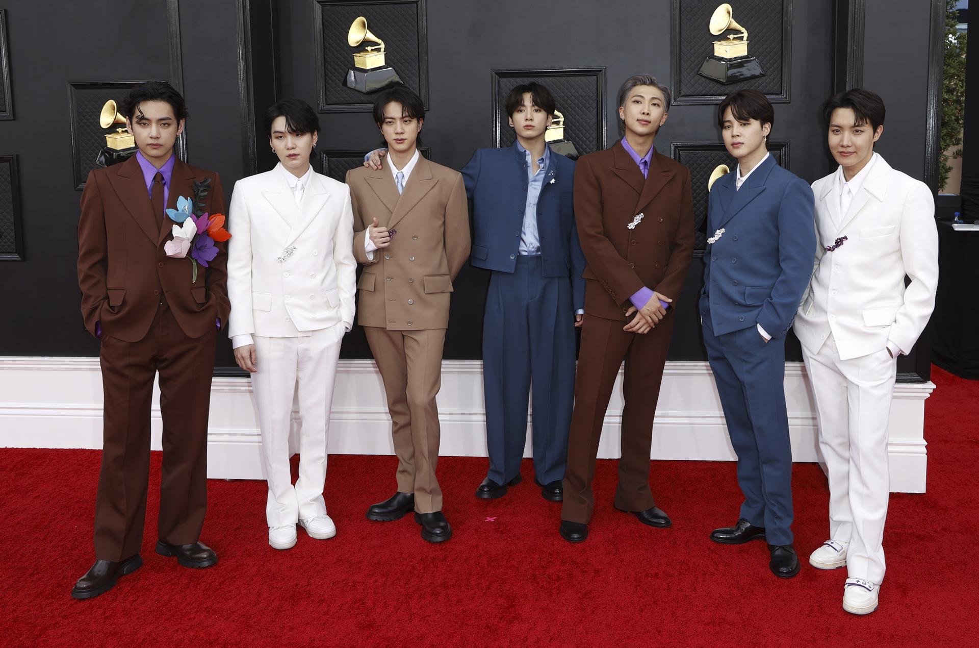 (FILE) (L-R) V, Suga, Jin, Jungkook, RM, Jimin and J-Hope of BTS arrive for the 64th annual Grammy Awards at the MGM Grand Garden Arena in Las Vegas, Nevada, US, 03 April 2022. EFE/EPA/DAVID SWANSON