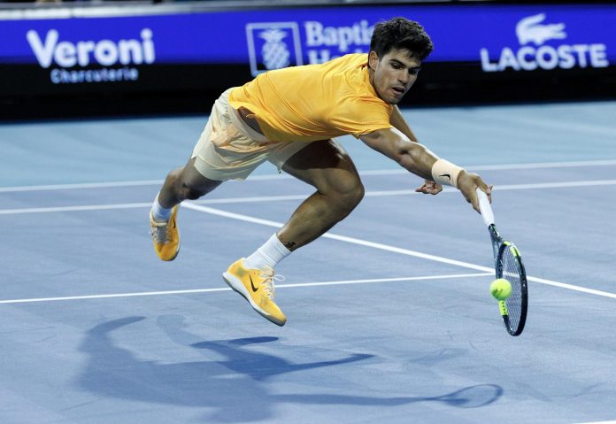 Alcaraz, Sabalenka advance in Miami; Landaluce stuns, Bucsa retires Carlos Alcaraz of Spain in action against Joao Fonseca of Brazil during their Men's Singles Round 2 match at the 2026 Miami Open tennis tournament at the Hard Rock Stadium in Miami, Florida, USA, 20 March 2026. EFE-EPA/CRISTOBAL HERRERA-ULASHKEVICH