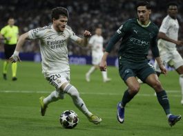 Real Madrid's Francisco Garcia (L) in action against Manchester City's Tijjani Reijnders (R) during the UEFA Champions League round-of-sixteen first leg soccer match between Real Madrid and Manchester City, in Madrid, Spain, 11 March 2026. EFE/ Juanjo Martín