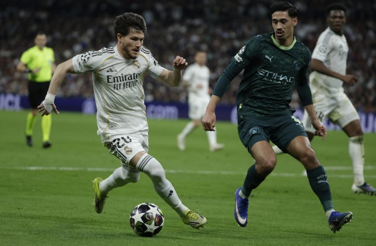 Real Madrid's Francisco Garcia (L) in action against Manchester City's Tijjani Reijnders (R) during the UEFA Champions League round-of-sixteen first leg soccer match between Real Madrid and Manchester City, in Madrid, Spain, 11 March 2026. EFE/ Juanjo Martín