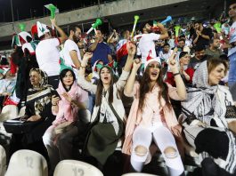 Iranian women and men cheer at the Azadi stadium in Tehran, Iran, 20 June 2018, as they attend the public viewing of the FIFA World Cup 2018 match between Iran and Spain played in Kazan, Russia. EFE-EPA/STR/FILE