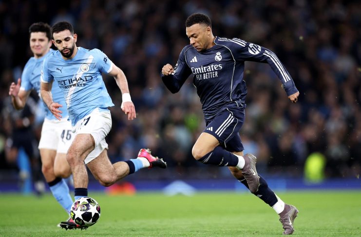Rayan Aït-Nouri (L) of Manchester City in action against Kylian Mbappe of Real Madrid during the UEFA Champions League Round of 16 2nd leg match between Manchester City and Real Madrid in Manchester, Great Britain, 17 March 2026. EFE/EPA/ADAM VAUGHAN