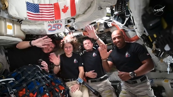 A video screenshot taken from the official NASA X account shows astronauts Reid Wiseman, Christina Koch, Jeremy Hansen, and Victor Glover (from left) waving during a live conversation from the Artemis II Orion spacecraft with US President Donald Trump. EFE/ @NASA