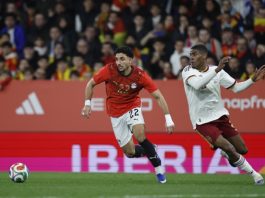 Egypt's Omar Marmoush (L) in action against Spain's Cristhian Mosquera (R) during the international friendly soccer match between Spain and Egypt, in Barcelona, Spain, 31 March 2026. EFE-EPA/Alberto Estevez