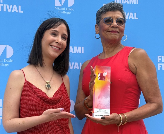 Actress and screenwriter Sonia Manzano (right) poses with the Impact Award alongside Miami Film Festival (MFF) programming director Lauren Cohen during the presentation of the documentary 'Street Smart: Lessons from a TV Icon' on April 11, 2026, in Miami, USA. EFE/Antoni Belchi
