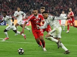 Kylian Mbappe of Real Madrid (C-R) in action against Jonathan Tah of Bayern Munich (C-L) during the UEFA Champions League quarter-finals, 2nd leg match FC Bayern Munich against Real Madrid, in Munich, Germany, 15 April 2026. EFE/EPA/RONALD WITTEK