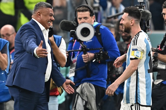 Lionel Messi (R) of Argentina celebrates with Claudio Tapia, president of the Argentine Football Association, after winning the FIFA World Cup 2022 semi final between Argentina and Croatia at Lusail Stadium in Lusail, Qatar, 13 December 2022. EFE-EPA/Noushad Thekkayil