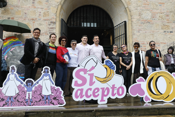 The director of the National Museum, Katia Gonzalez, poses with members of the LGBTIQ community during an event in Bogota, Colombia, 28 June 2026. EFE/Carlos Ortega