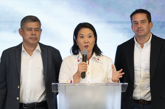 Peruvian presidential candidate Keiko Fujimori speaks alongside her vice-presidential running mate, Luis Galarreta (L) and Miguel Torres, after the results of the second round of elections in Lima, Peru, 07 June 2026. EFE/John Reyes Mejia