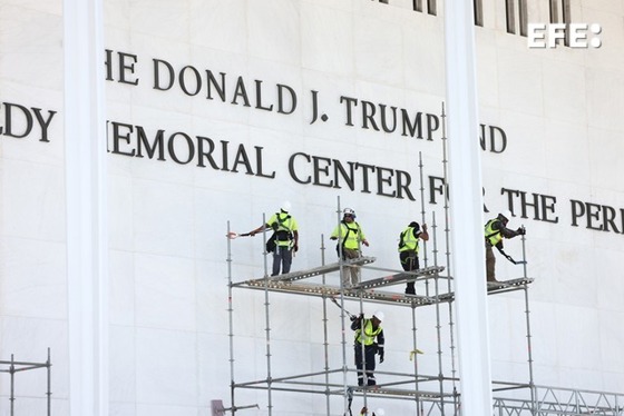 Workers prepare to remove US President Donald J. Trump's name from the facade of the John F. Kennedy Center for the Performing Arts in Washington, DC, US, 12 June 2026. EFE/EPA/JIM LO SCALZO