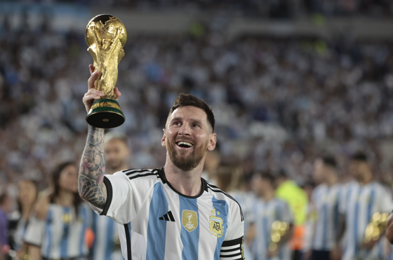 (FILES) File photo dated on 23 March 2023 of Argentinan soccer player Lionel Messi of Argentina shows the trophy of FIFA World Cup after an international friendly soccer match between the national teams of Argentina and Panama at Monumental stadium in Buenos Aires, Argentina. Messi won Princess of Asturias Award for Sports 2026, prize's panel president announce in a press conference held in Oviedo, northern Spain, 03 June 2026. EFE/Juan Ignacio Roncoroni