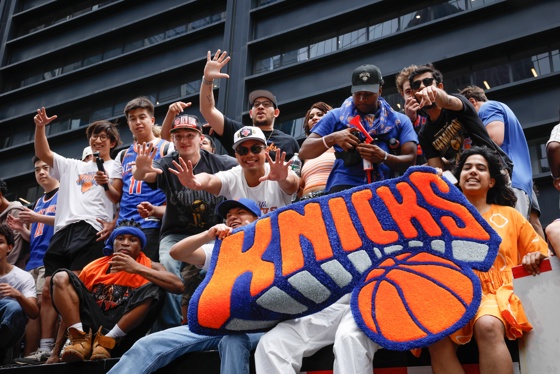 The New York Knicks celebrated their first NBA title since 1973 on Thursday with a massive parade that turned Lower Manhattan orange and blue and transformed Broadway into a human tide where fans, music, and celebrities mingled.