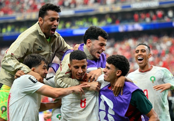 Houston, Texa, 07/04/2026.- Azzedine Ounahi of Morocco (C) celebrates with teammates scoring the 2-0 during the FIFA World Cup 2026 Round of 16 match Canada against Morocco, in Houston, USA, 04 July 2026. (Marruecos) EFE/EPA/SAM WASSON