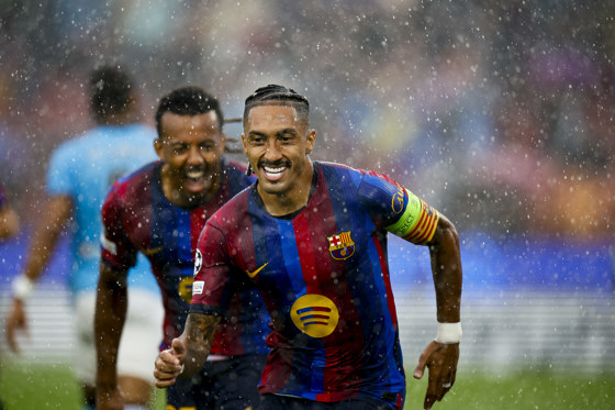 Barcelona player Raphinha (R) after scoring the first goal of the team during the Champions League match between Barcelona and Feyenoord at the Spotify Camp Nou in Barcelona, Spain, 9 September 2026. EFE/ Alberto Estevez