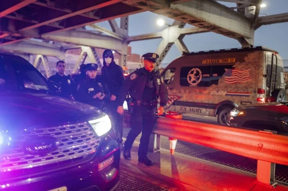 Police officers escort an alleged ICE vehicle at the crime scene after an ICE officer allegedly shoots a man in New York, New York, USA, 08 October 2026. EFE-EPA/OLGA FEDOROVA